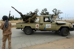 Libye: dix ans après la mort de Mouammar Kadhafi, l'économie otage des milices